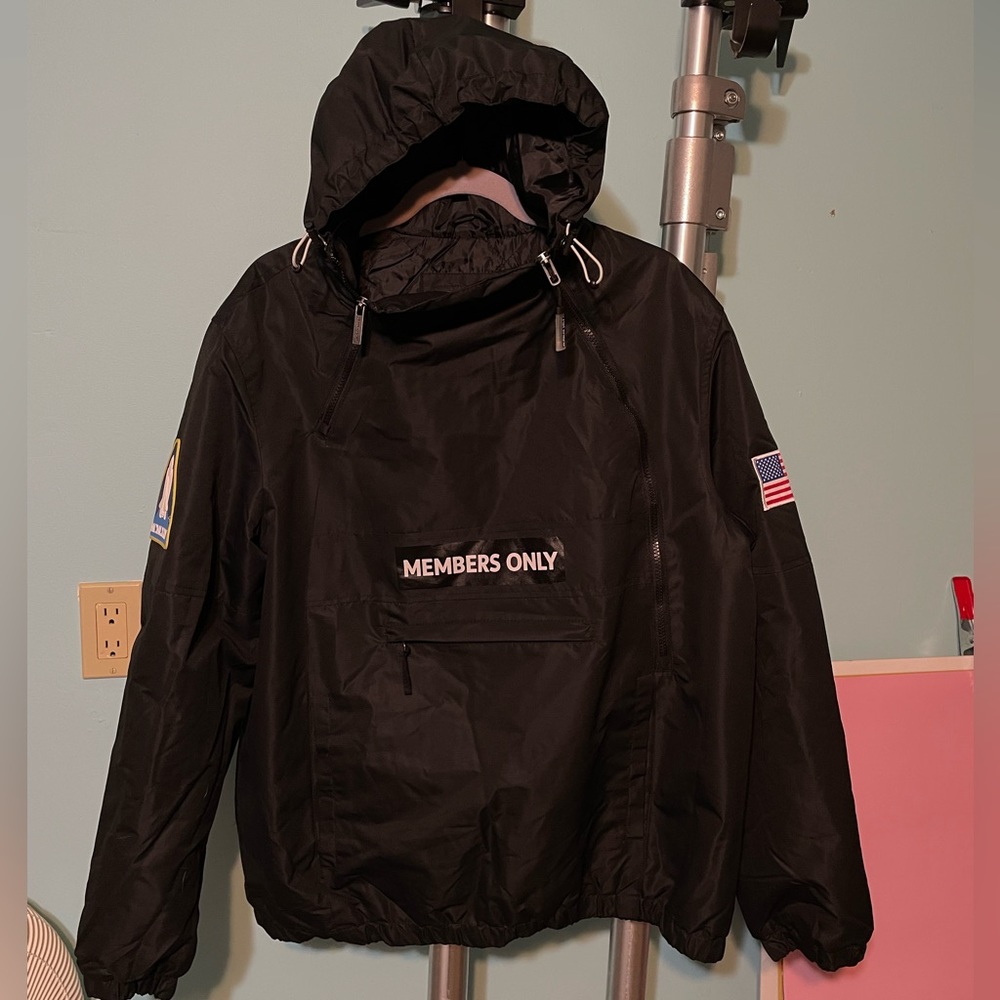 Member’s Only Waterproof Jacket, size XL.